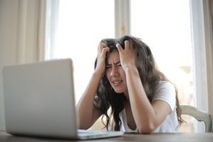 Woman feeling frustrated, because people tell her she's too much.