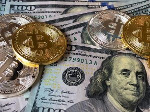 Picture of different dollars and coins from around the world